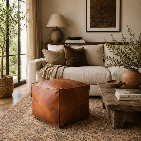 Anchor your room with a sleek, handmade Moroccan square leather pouf.