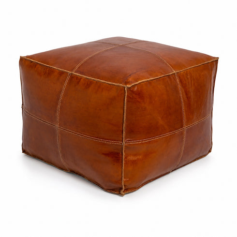 Anchor your room with a sleek, handmade Moroccan square leather pouf.