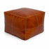 Anchor your room with a sleek, handmade Moroccan square leather pouf.
