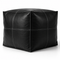 Anchor your room with a sleek, handmade Moroccan square leather pouf.