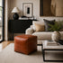 Anchor your room with a sleek, handmade Moroccan square leather pouf.
