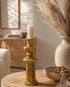 Illuminate your living spaces with our Art of handmade Tamegroute pottery candlestick set.
