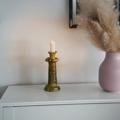 Illuminate your living spaces with our Art of handmade Tamegroute pottery candlestick set.