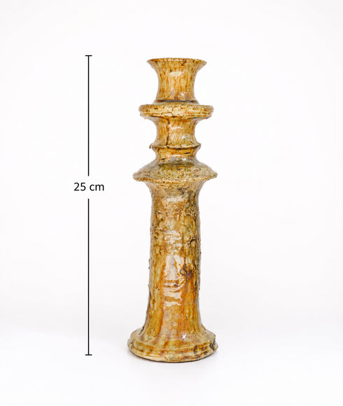 Illuminate your living spaces with our Art of handmade Tamegroute pottery candlestick set.
