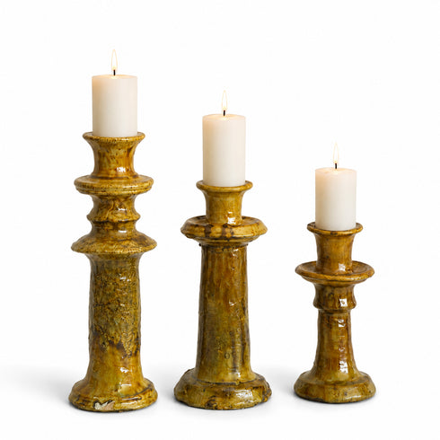 Illuminate your living spaces with our Art of handmade Tamegroute pottery candlestick set.