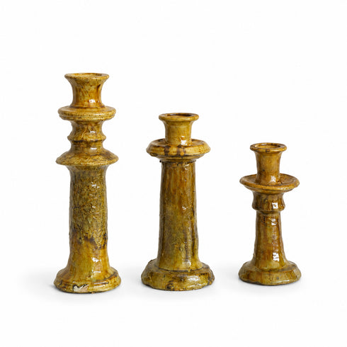 Illuminate your living spaces with our Art of handmade Tamegroute pottery candlestick set.