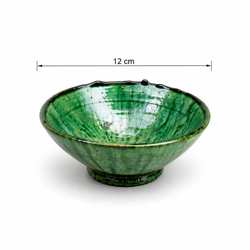 Elevate your dining table centerpiece with our handmade Moroccan Tamegroute stemmed fruit bowl, a timeless piece of artisan pottery crafted in Morocco.