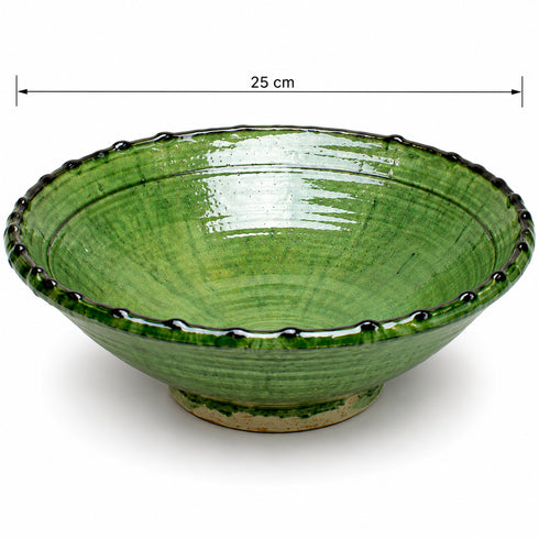Elevate your dining table centerpiece with our handmade Moroccan Tamegroute stemmed fruit bowl, a timeless piece of artisan pottery crafted in Morocco.
