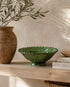Elevate your dining table centerpiece with our handmade Moroccan Tamegroute stemmed fruit bowl, a timeless piece of artisan pottery crafted in Morocco.