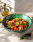 Elevate your dining table centerpiece with our handmade Moroccan Tamegroute stemmed fruit bowl, a timeless piece of artisan pottery crafted in Morocco.