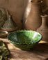 Elevate your dining table centerpiece with our handmade Moroccan Tamegroute stemmed fruit bowl, a timeless piece of artisan pottery crafted in Morocco.