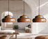 Brighten your home design with a stunning Art of handmade tiered copper pendant set.
