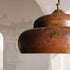 Brighten your home design with a stunning Art of handmade tiered copper pendant set.
