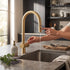 Traditional Pull-Down Kitchen Faucet in Unlacquered Brass – High-Arc Gooseneck Design