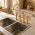 Trio Unlacquered Brass Bridge Kitchen Faucet with Gooseneck Spout
