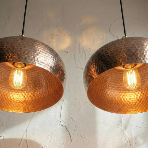 Brighten your kitchen island with a stunning Art of handmade vintage copper lamp set.