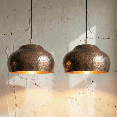 Brighten your kitchen island with a stunning Art of handmade vintage copper lamp set.