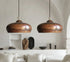 Illuminate your kitchen island with this rustic Art of handmade copper dome pendant.