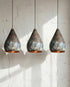 Illuminate your kitchen island with a rustic Art of handmade copper pendant light.