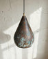 Illuminate your kitchen island with a rustic Art of handmade copper pendant light.