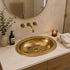 Elevate your bathroom countertop with an Art of handmade brass oval engraved sink.